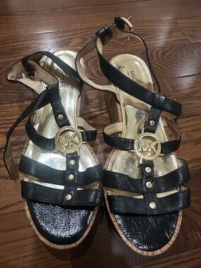 Michael Kors Black and Gold MK Logo Strappy Wedge Sandals